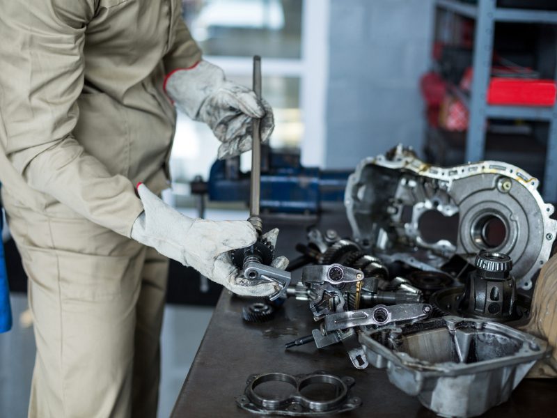 mechanic-checking-car-parts